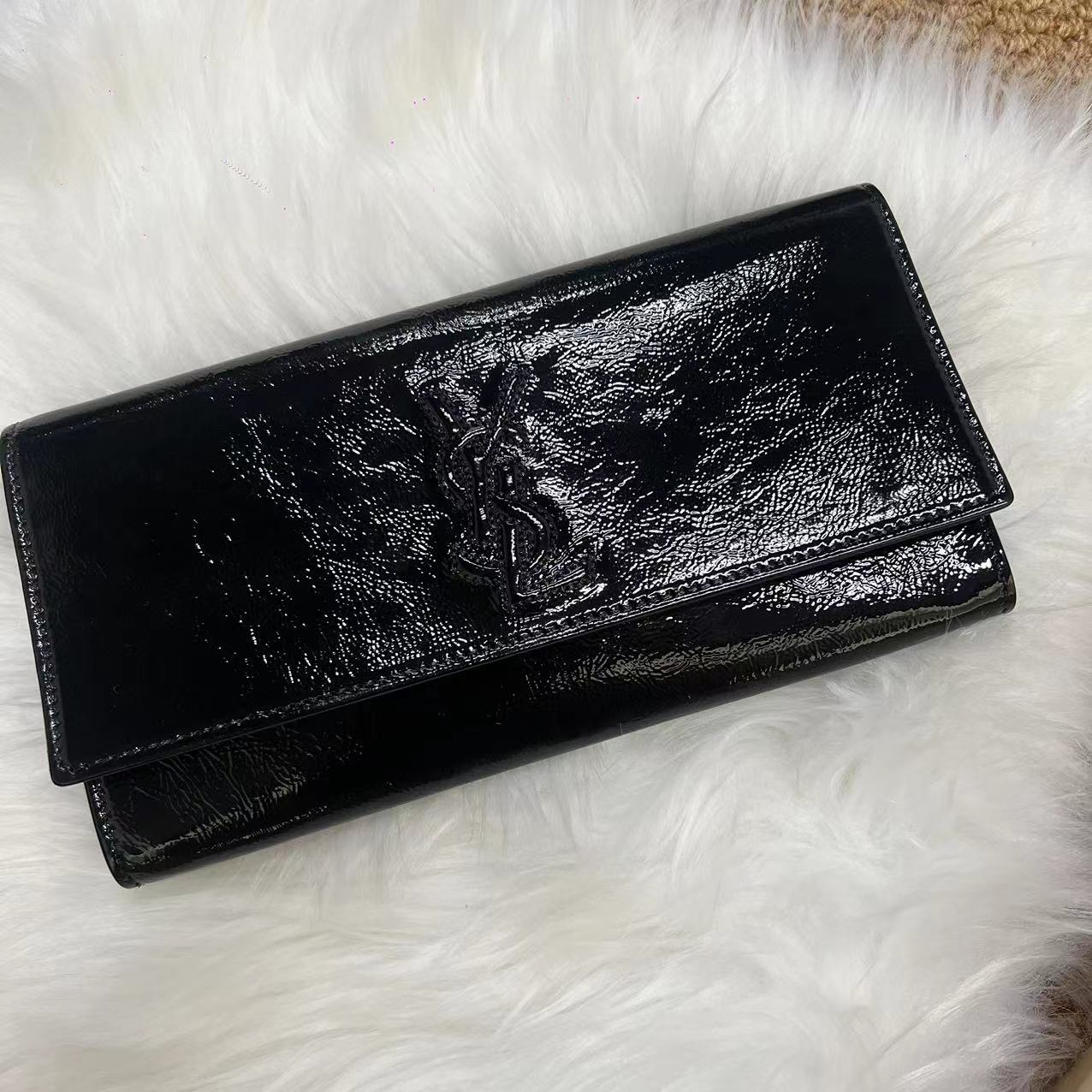 Yves Saint Laurent Patent leather clutch bag