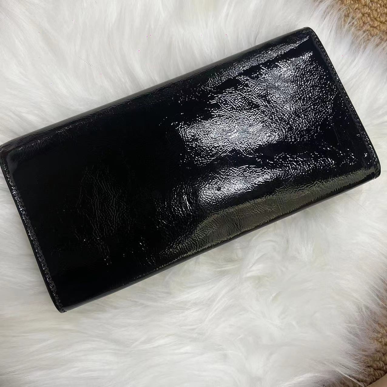 Yves Saint Laurent Patent leather clutch bag