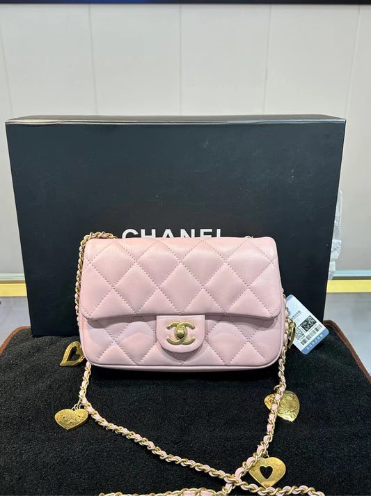 Chanel Pink 22B Mini Flap Bag in Lambskin Leather with Gold Hardware and Hearts Chain